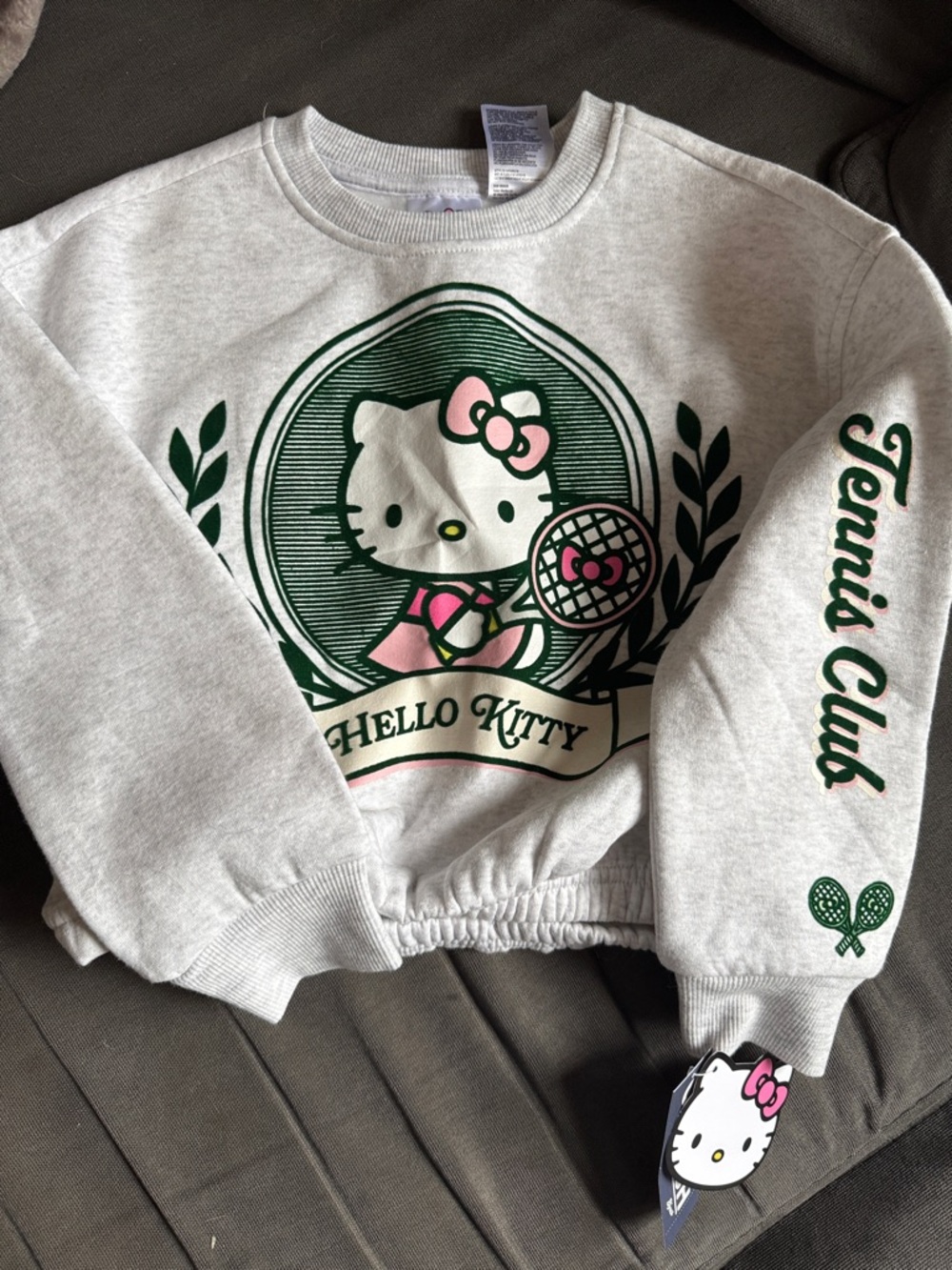 Hello Kitty Gray Cropped Sweatshirt with Green & Pink Tennis Graphic